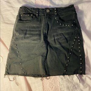 Black mini skirt with studs